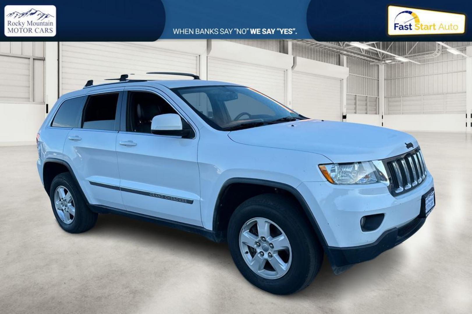 2013 White Jeep Grand Cherokee Laredo 2WD (1C4RJEAG6DC) with an 3.6L V6 DOHC 24V engine, 5-Speed Automatic transmission, located at 7755 State Street, Midvale, UT, 84047, (801) 753-9063, 40.610329, -111.890656 - Photo#0