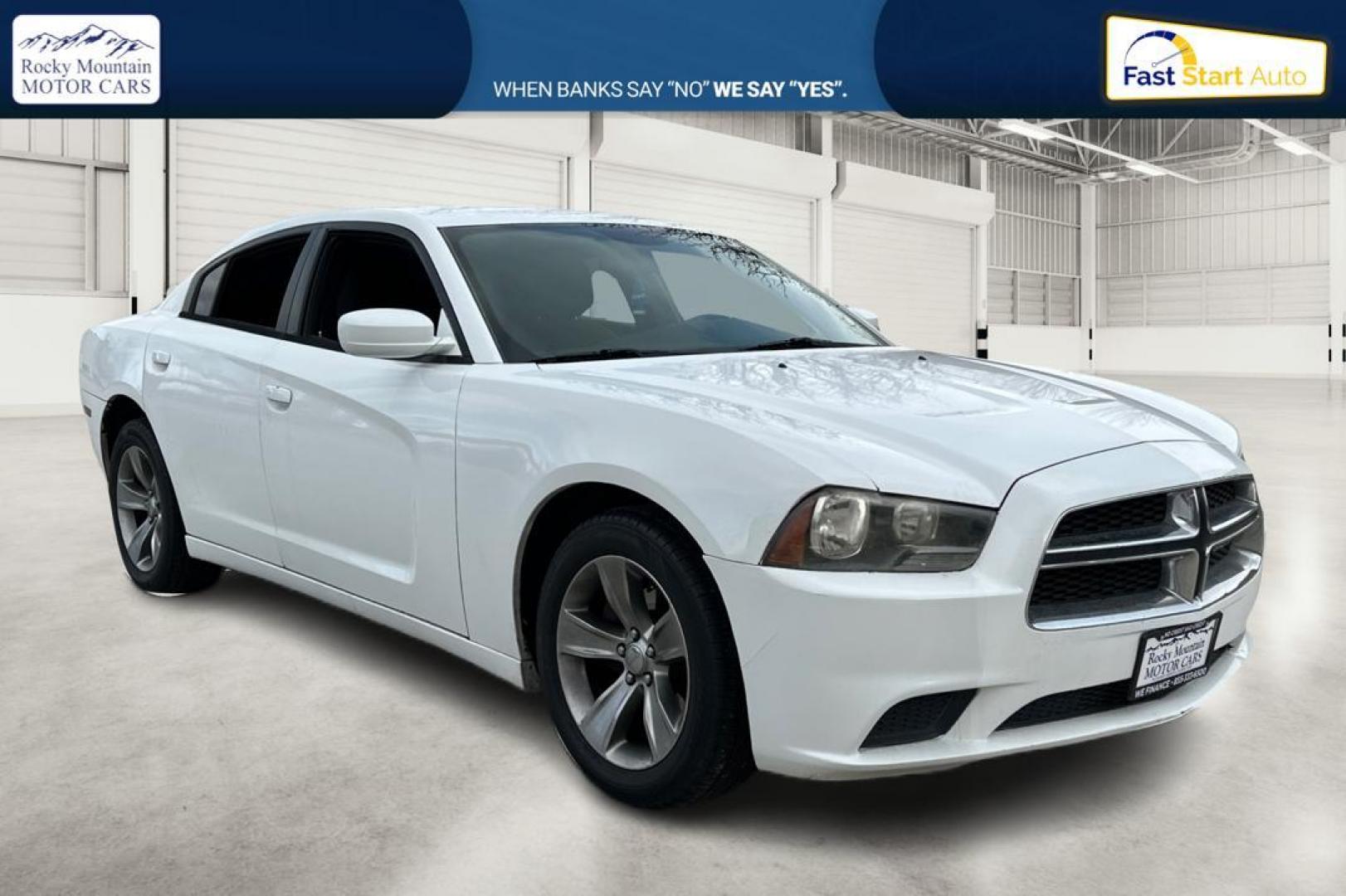 2014 White Dodge Charger SE (2C3CDXBG4EH) with an 3.6L V6 DOHC 24V engine, 5-Speed Automatic transmission, located at 7755 State Street, Midvale, UT, 84047, (801) 753-9063, 40.610329, -111.890656 - Photo#0