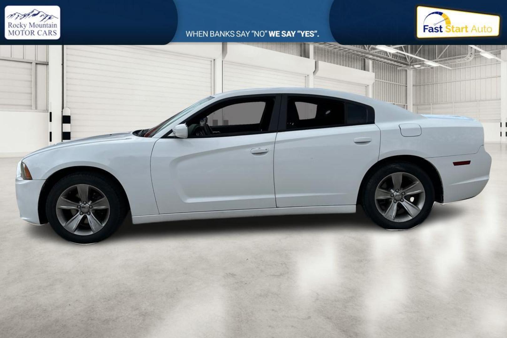 2014 White Dodge Charger SE (2C3CDXBG4EH) with an 3.6L V6 DOHC 24V engine, 5-Speed Automatic transmission, located at 7755 State Street, Midvale, UT, 84047, (801) 753-9063, 40.610329, -111.890656 - Photo#6