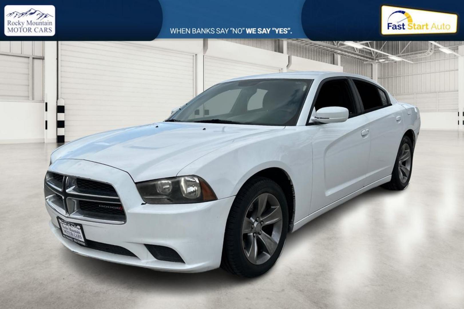 2014 White Dodge Charger SE (2C3CDXBG4EH) with an 3.6L V6 DOHC 24V engine, 5-Speed Automatic transmission, located at 7755 State Street, Midvale, UT, 84047, (801) 753-9063, 40.610329, -111.890656 - Photo#8