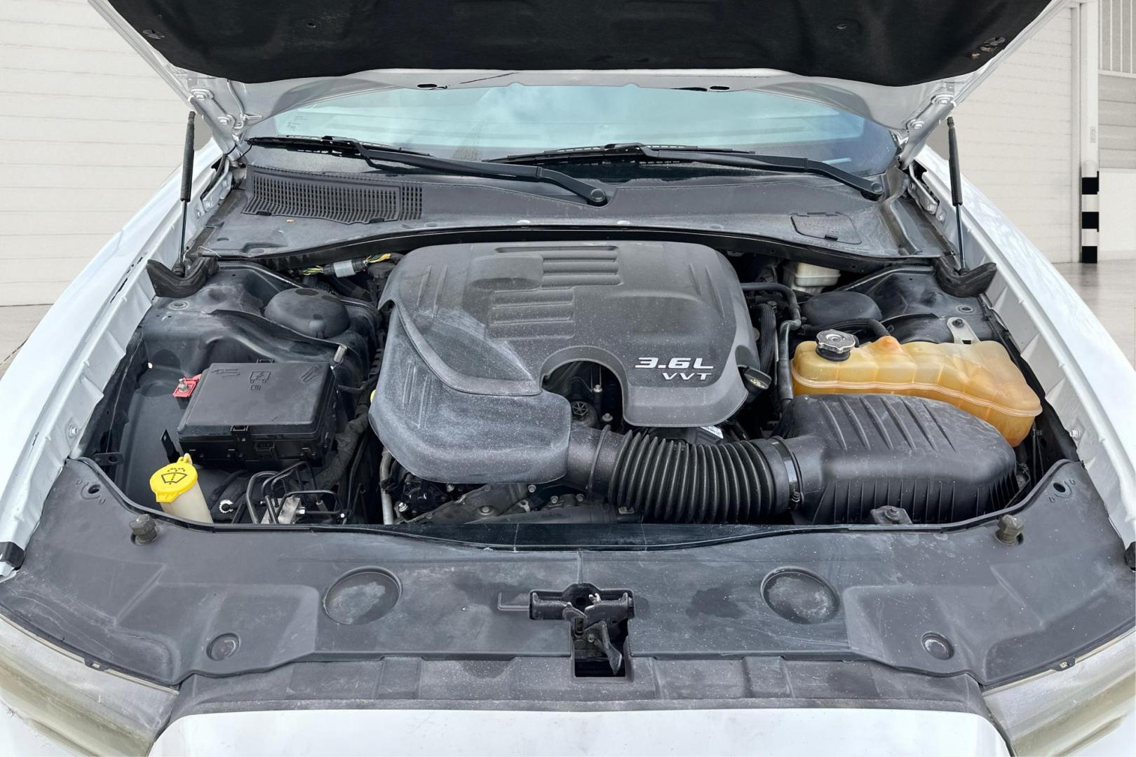 2014 White Dodge Charger SE (2C3CDXBG4EH) with an 3.6L V6 DOHC 24V engine, 5-Speed Automatic transmission, located at 7755 State Street, Midvale, UT, 84047, (801) 753-9063, 40.610329, -111.890656 - Photo#10