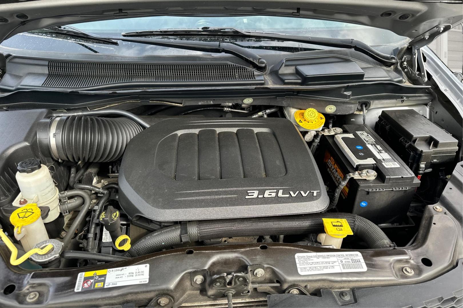2014 Silver Dodge Grand Caravan SE (2C4RDGBG8ER) with an 3.6L V6 DOHC 24V engine, 6-Speed Automatic transmission, located at 344 S Washington Blvd, Ogden, UT, 84404, (801) 399-1799, 41.255482, -111.970848 - Photo#10