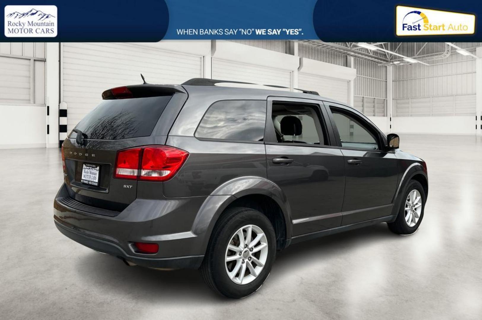 2014 Gray Dodge Journey SXT (3C4PDCBB6ET) with an 2.4L L6 DOHC 16V engine, 4-Speed Automatic transmission, located at 7755 State Street, Midvale, UT, 84047, (801) 753-9063, 40.610329, -111.890656 - Photo#2