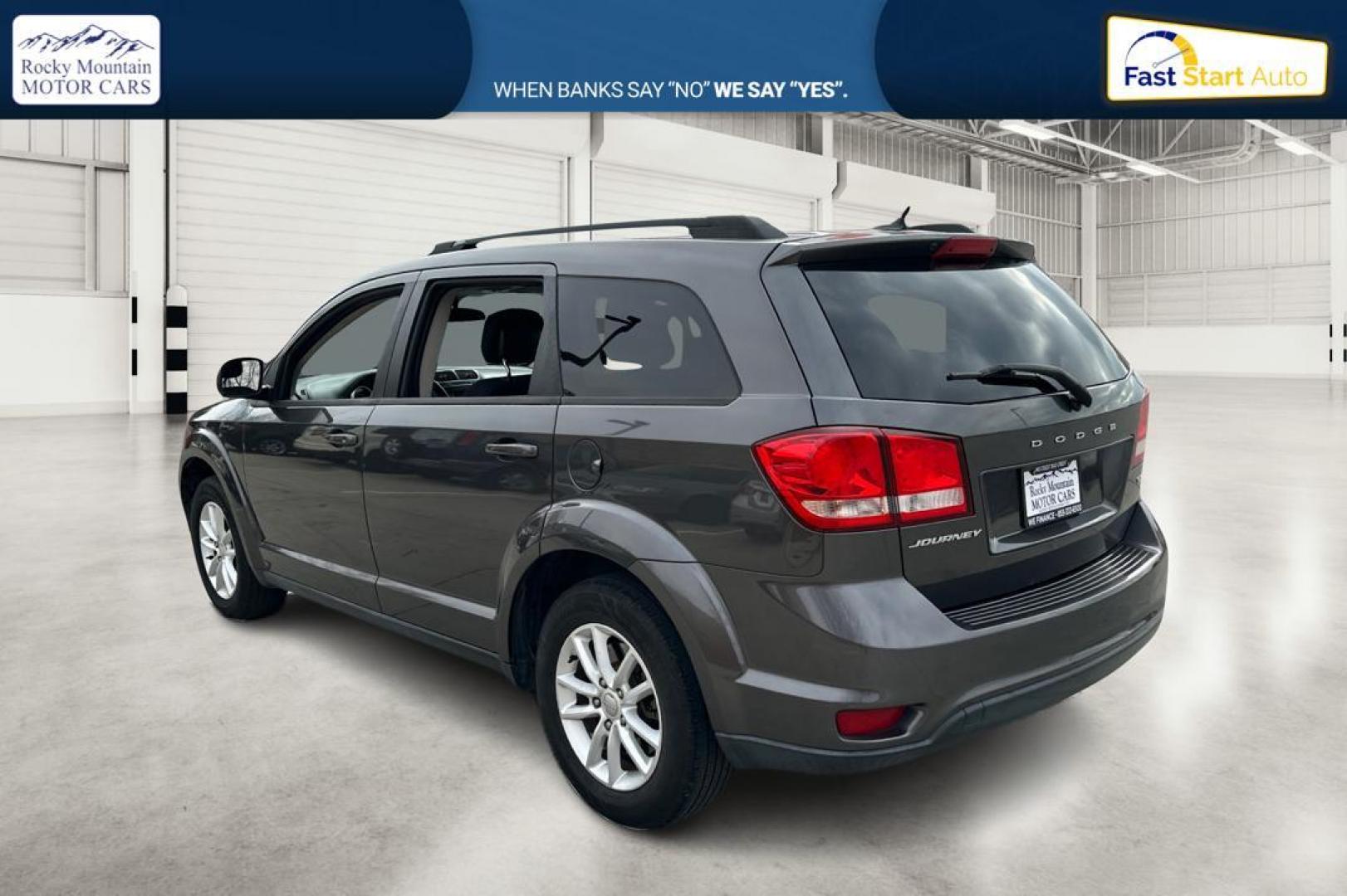 2014 Gray Dodge Journey SXT (3C4PDCBB6ET) with an 2.4L L6 DOHC 16V engine, 4-Speed Automatic transmission, located at 7755 State Street, Midvale, UT, 84047, (801) 753-9063, 40.610329, -111.890656 - Photo#5