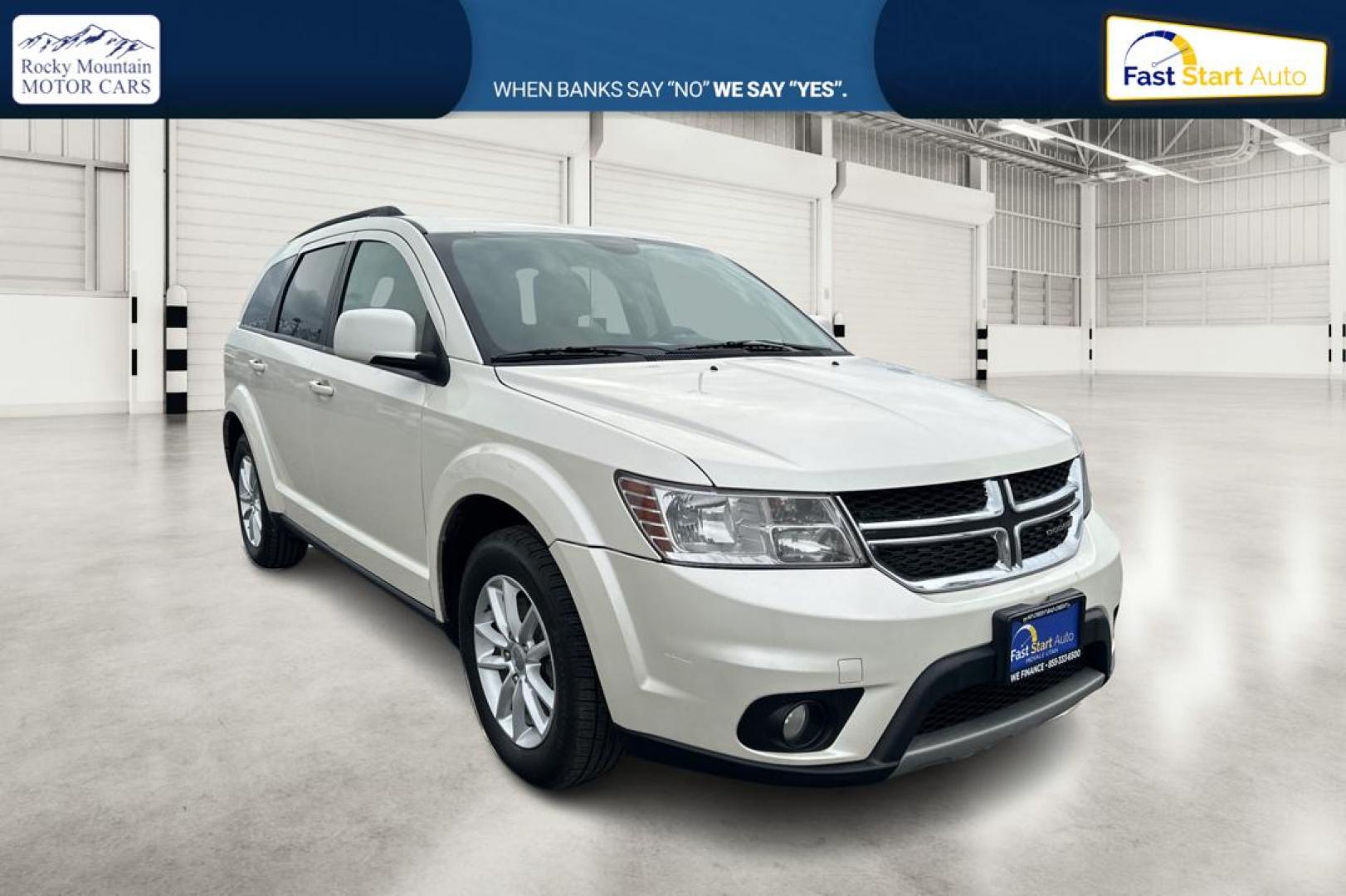 2014 White Dodge Journey SXT (3C4PDCBG2ET) with an 3.6L V6 DOHC 24V engine, 6-Speed Automatic transmission, located at 7755 State Street, Midvale, UT, 84047, (801) 753-9063, 40.610329, -111.890656 - Photo#0