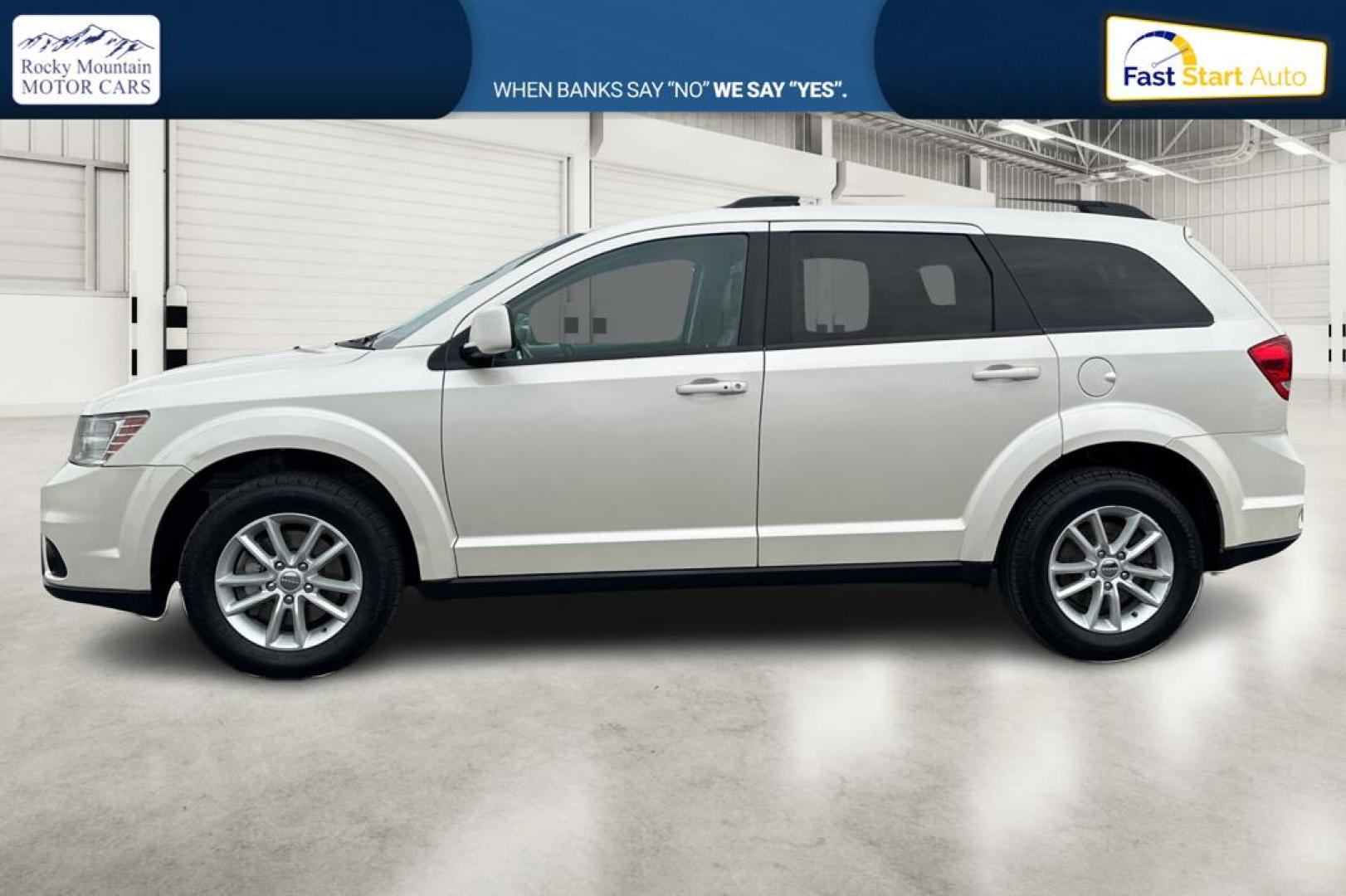 2014 White Dodge Journey SXT (3C4PDCBG2ET) with an 3.6L V6 DOHC 24V engine, 6-Speed Automatic transmission, located at 7755 State Street, Midvale, UT, 84047, (801) 753-9063, 40.610329, -111.890656 - Photo#6