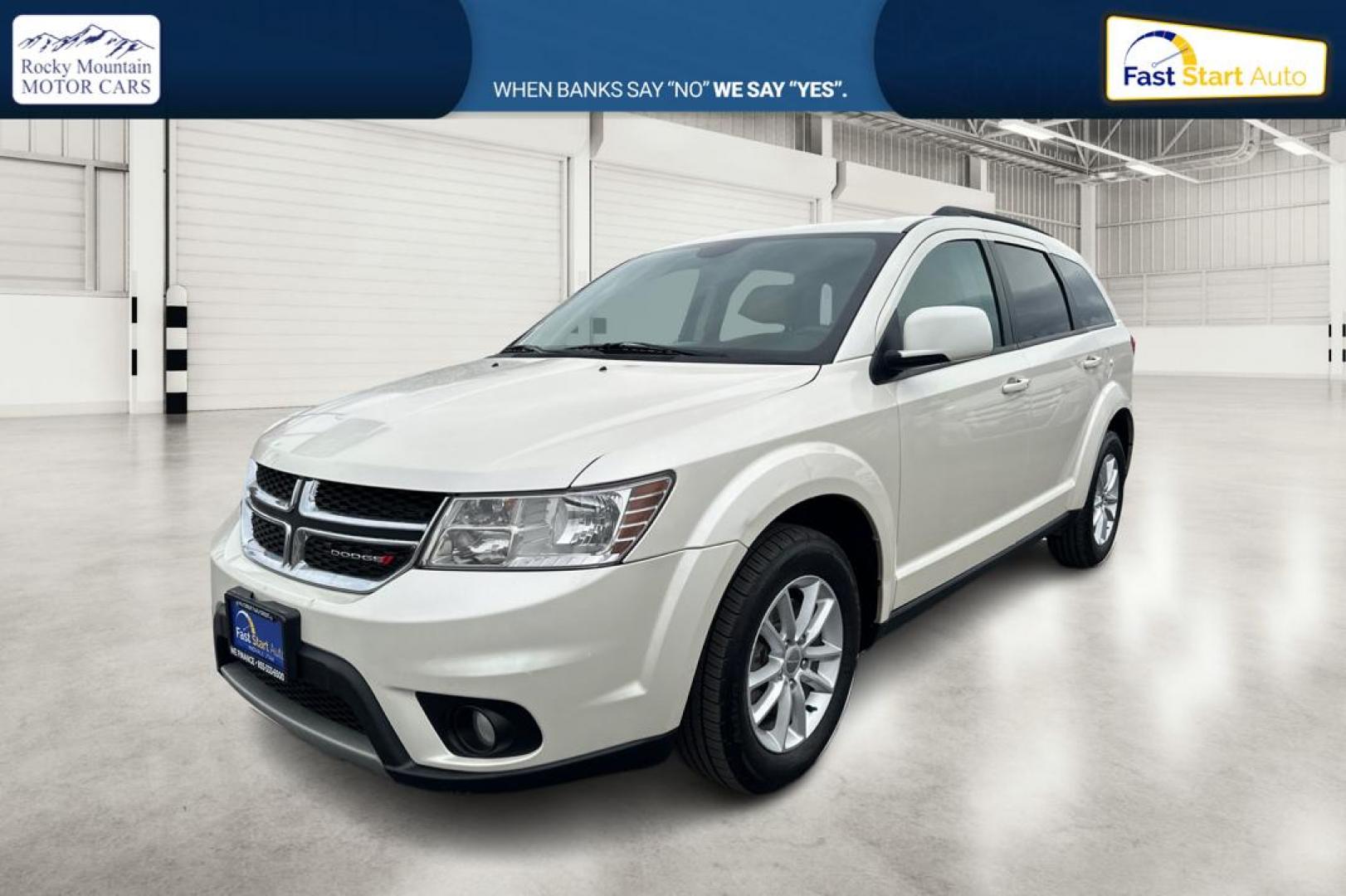 2014 White Dodge Journey SXT (3C4PDCBG2ET) with an 3.6L V6 DOHC 24V engine, 6-Speed Automatic transmission, located at 7755 State Street, Midvale, UT, 84047, (801) 753-9063, 40.610329, -111.890656 - Photo#8