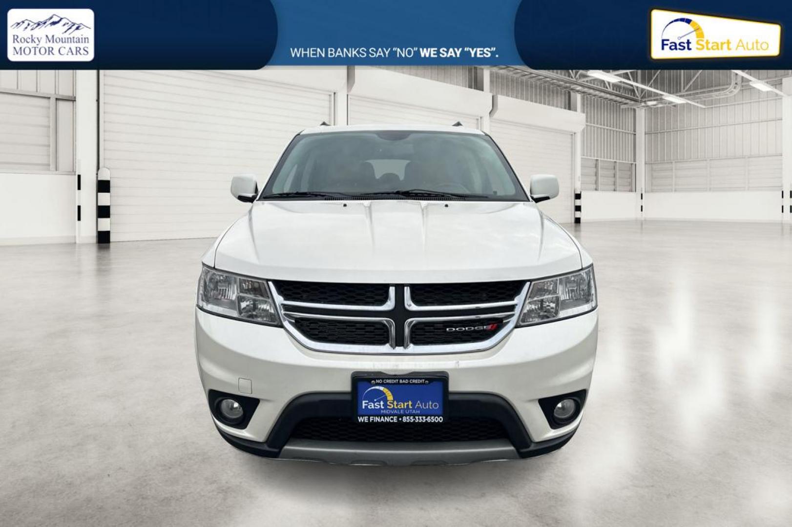 2014 White Dodge Journey SXT (3C4PDCBG2ET) with an 3.6L V6 DOHC 24V engine, 6-Speed Automatic transmission, located at 7755 State Street, Midvale, UT, 84047, (801) 753-9063, 40.610329, -111.890656 - Photo#9