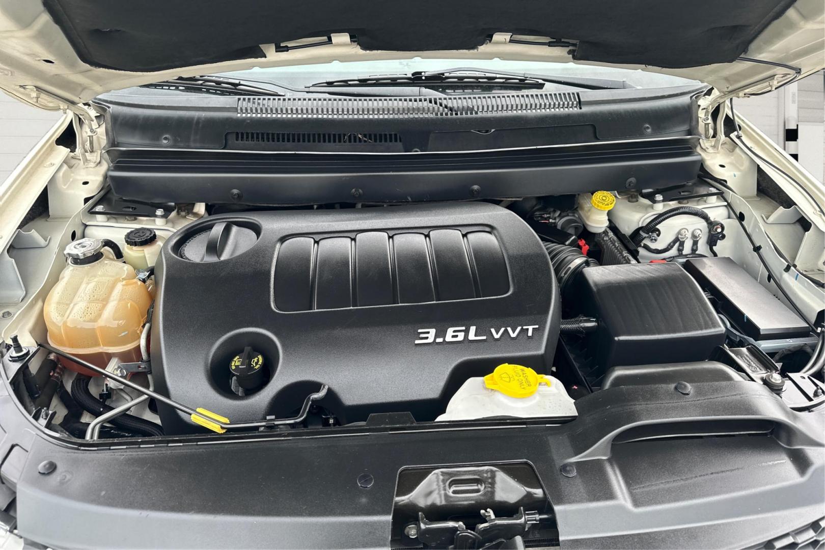 2014 White Dodge Journey SXT (3C4PDCBG2ET) with an 3.6L V6 DOHC 24V engine, 6-Speed Automatic transmission, located at 7755 State Street, Midvale, UT, 84047, (801) 753-9063, 40.610329, -111.890656 - Photo#10