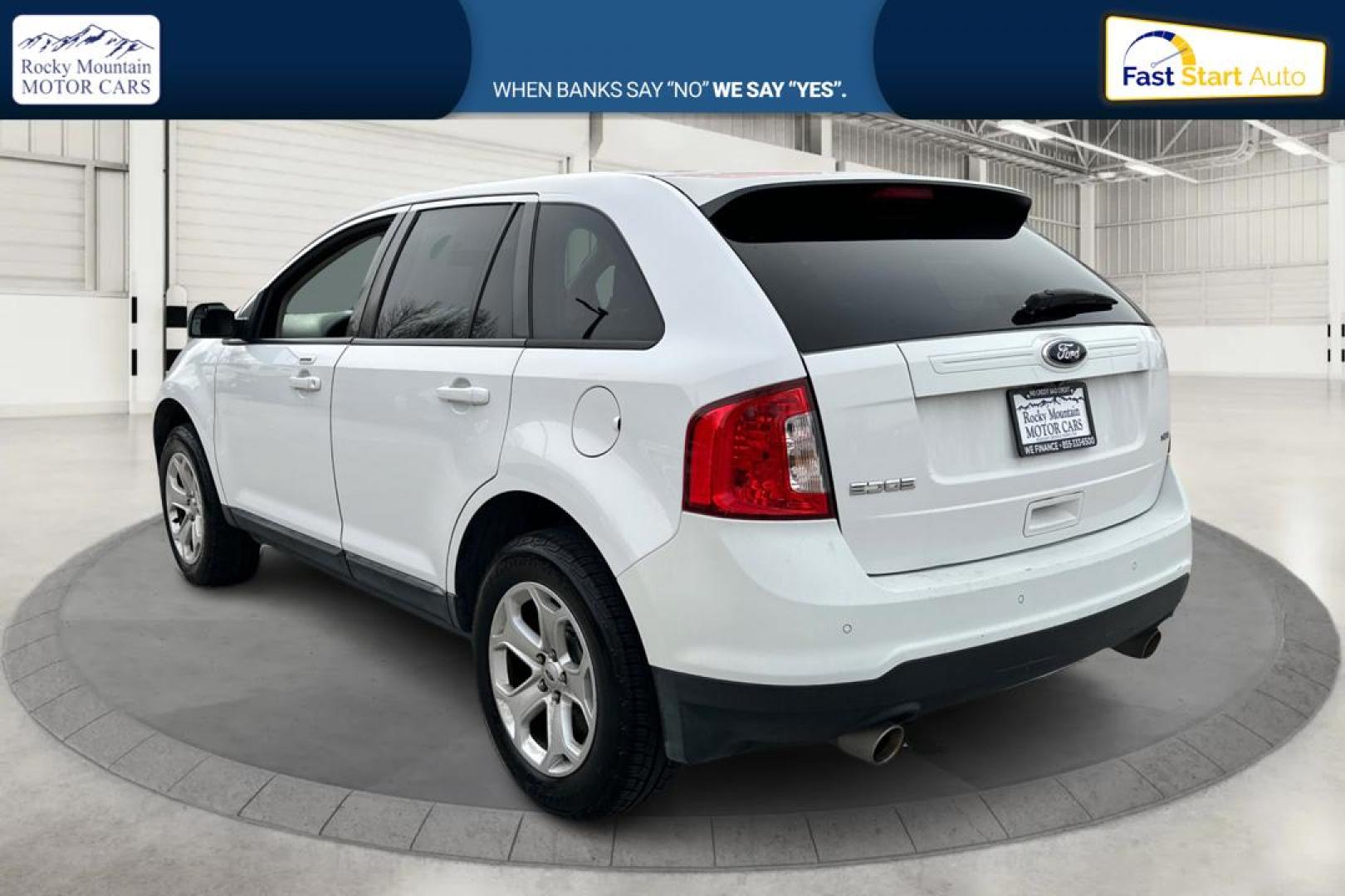 2014 White Ford Edge SEL FWD (2FMDK3JC9EB) with an 3.5L V6 DOHC 24V engine, 6-Speed Automatic transmission, located at 767 S State Road, Pleasant Grove, UT, 84062, (801) 785-1058, 40.354839, -111.736687 - Photo#4