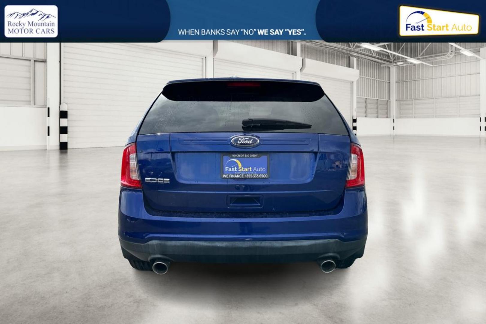 2014 Blue Ford Edge SE FWD (2FMDK3GC1EB) with an 3.5L V6 DOHC 24V engine, 6-Speed Automatic transmission, located at 7755 State Street, Midvale, UT, 84047, (801) 753-9063, 40.610329, -111.890656 - Photo#4