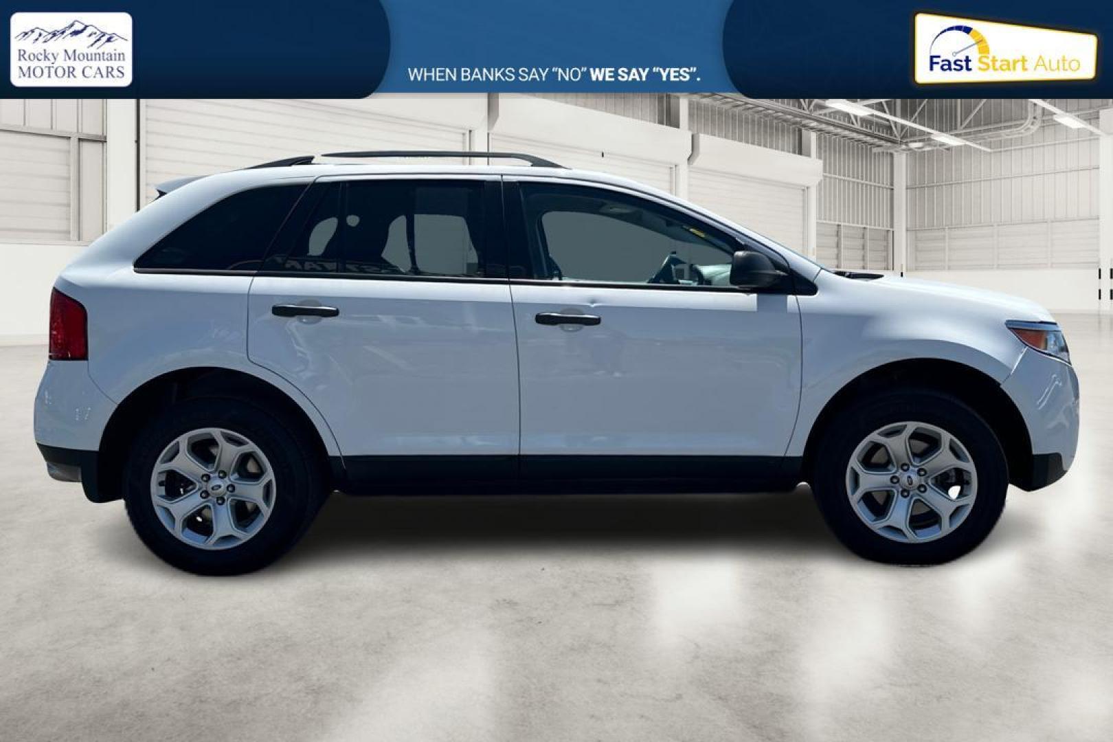 2014 White Ford Edge SE AWD (2FMDK4GCXEB) with an 3.5L V6 DOHC 24V engine, 6-Speed Automatic transmission, located at 767 S State Road, Pleasant Grove, UT, 84062, (801) 785-1058, 40.354839, -111.736687 - Photo#1