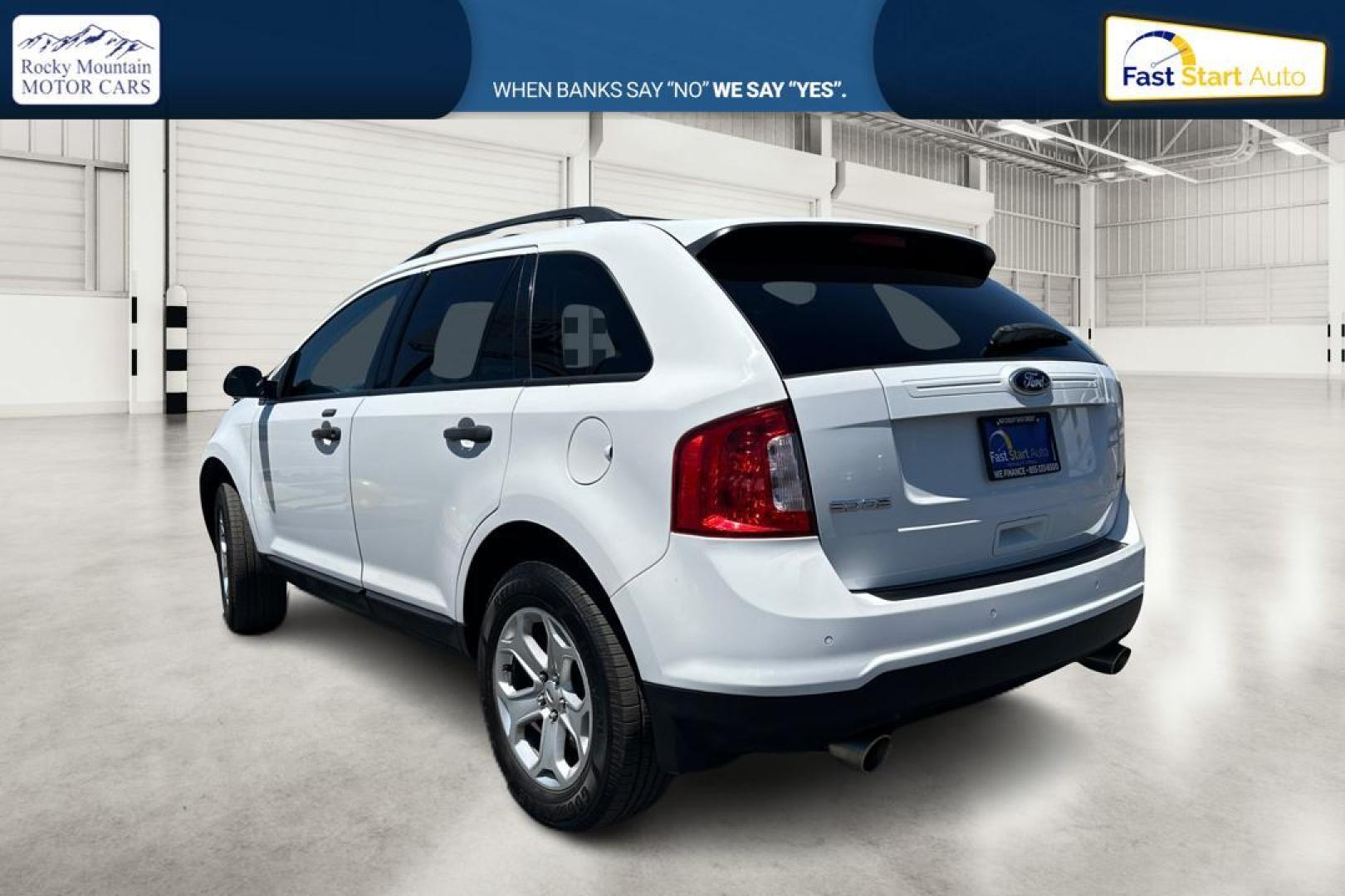 2014 White Ford Edge SE AWD (2FMDK4GCXEB) with an 3.5L V6 DOHC 24V engine, 6-Speed Automatic transmission, located at 767 S State Road, Pleasant Grove, UT, 84062, (801) 785-1058, 40.354839, -111.736687 - Photo#5