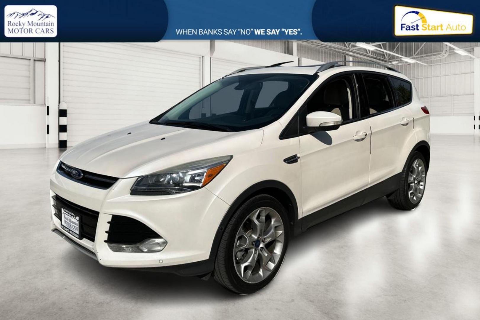 2014 White Ford Escape Titanium 4WD (1FMCU9J96EU) with an 2.0L L4 DOHC 16V engine, 6-Speed Automatic transmission, located at 767 S State Road, Pleasant Grove, UT, 84062, (801) 785-1058, 40.354839, -111.736687 - Photo#8