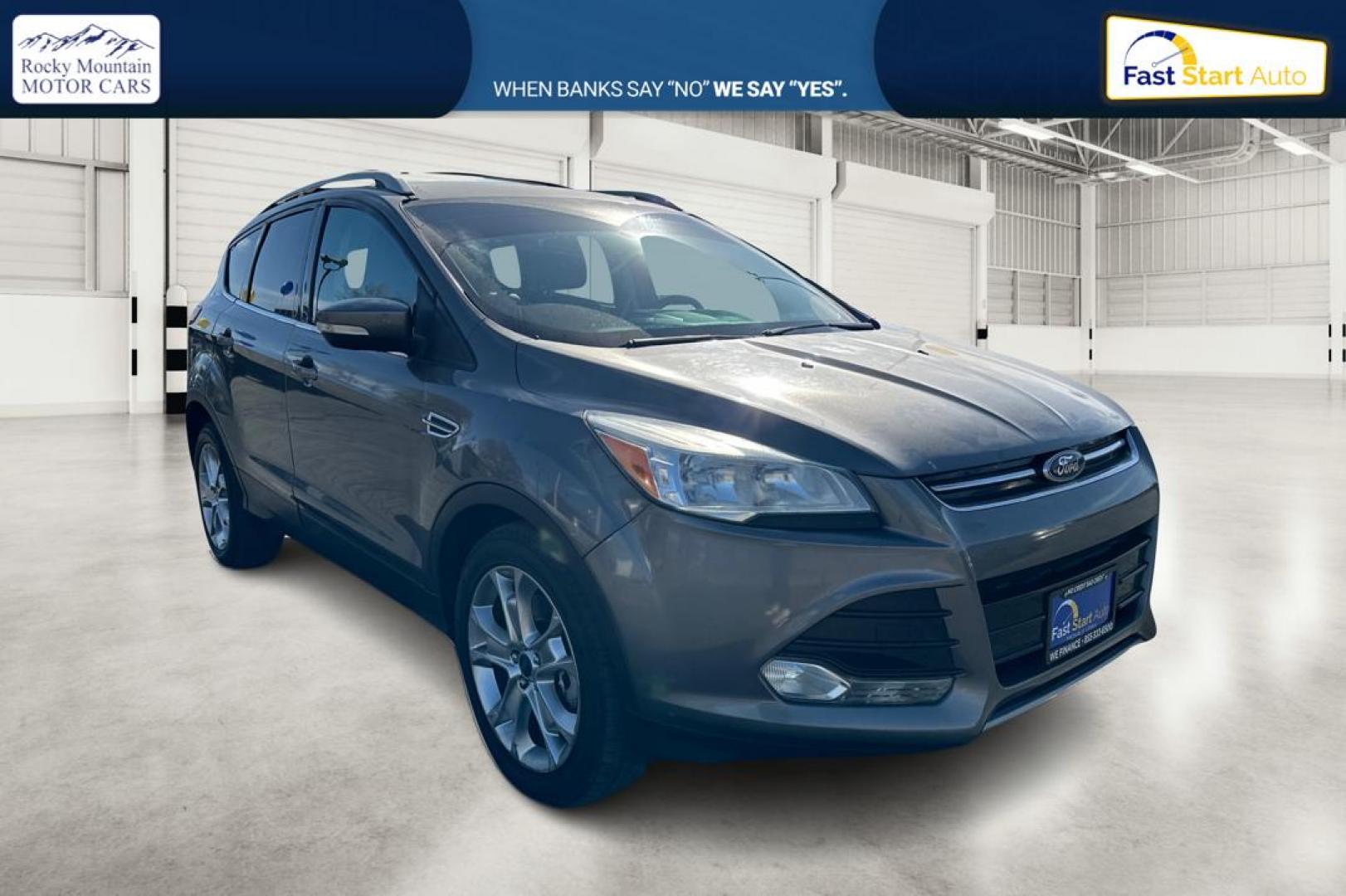 2014 Gray Ford Escape Titanium FWD (1FMCU0J97EU) with an 2.0L L4 DOHC 16V engine, 6-Speed Automatic transmission, located at 7755 State Street, Midvale, UT, 84047, (801) 753-9063, 40.610329, -111.890656 - Photo#0