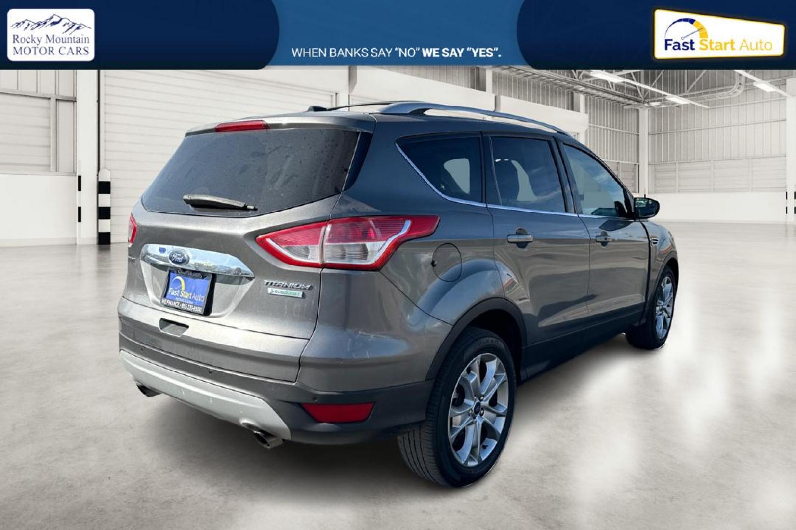 2014 Gray Ford Escape Titanium FWD (1FMCU0J97EU) with an 2.0L L4 DOHC 16V engine, 6-Speed Automatic transmission, located at 7755 State Street, Midvale, UT, 84047, (801) 753-9063, 40.610329, -111.890656 - Photo#2
