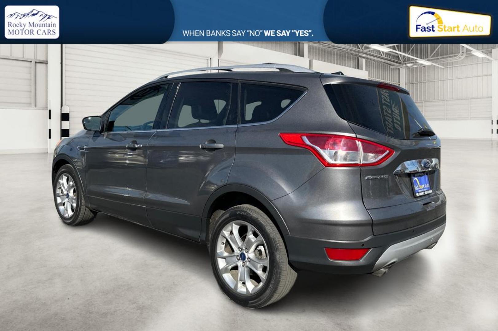 2014 Gray Ford Escape Titanium FWD (1FMCU0J97EU) with an 2.0L L4 DOHC 16V engine, 6-Speed Automatic transmission, located at 7755 State Street, Midvale, UT, 84047, (801) 753-9063, 40.610329, -111.890656 - Photo#5