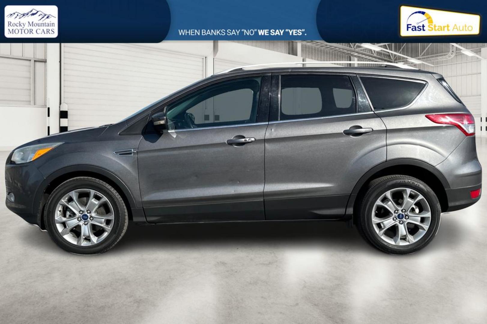 2014 Gray Ford Escape Titanium FWD (1FMCU0J97EU) with an 2.0L L4 DOHC 16V engine, 6-Speed Automatic transmission, located at 7755 State Street, Midvale, UT, 84047, (801) 753-9063, 40.610329, -111.890656 - Photo#6