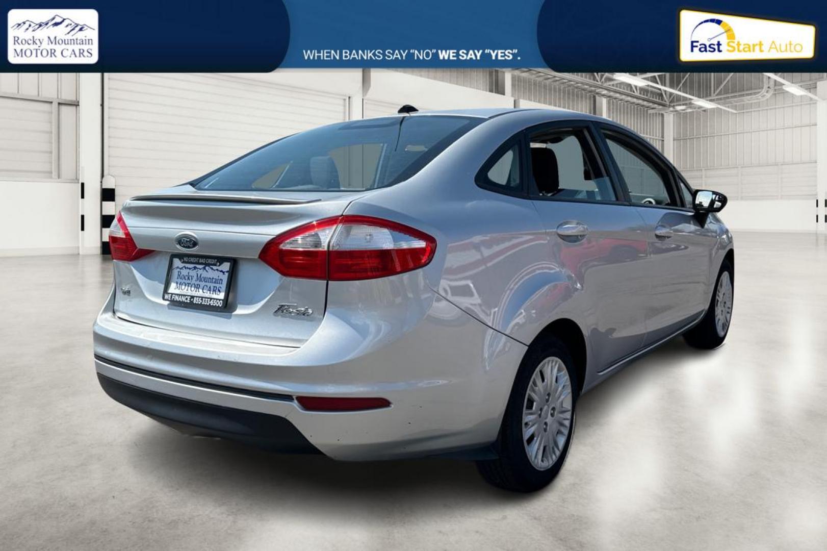 2014 Silver Ford Fiesta SE Sedan (3FADP4BJ8EM) with an 1.6L L4 DOHC 16V engine, Manual, 5-Spd transmission, located at 767 S State Road, Pleasant Grove, UT, 84062, (801) 785-1058, 40.354839, -111.736687 - Photo#2