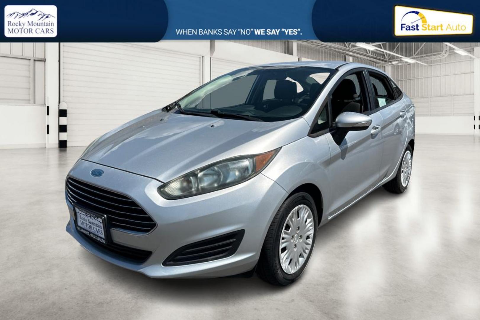 2014 Silver Ford Fiesta SE Sedan (3FADP4BJ8EM) with an 1.6L L4 DOHC 16V engine, Manual, 5-Spd transmission, located at 767 S State Road, Pleasant Grove, UT, 84062, (801) 785-1058, 40.354839, -111.736687 - Photo#8