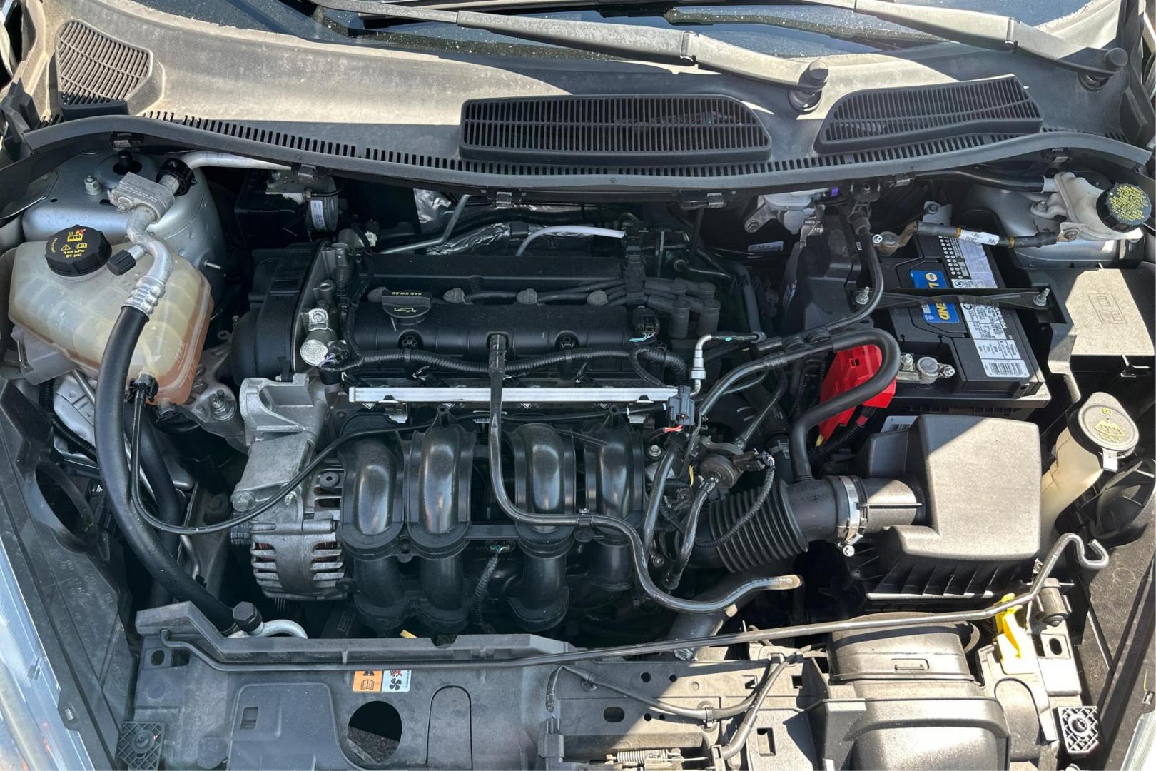 2014 Silver Ford Fiesta SE Sedan (3FADP4BJ8EM) with an 1.6L L4 DOHC 16V engine, Manual, 5-Spd transmission, located at 767 S State Road, Pleasant Grove, UT, 84062, (801) 785-1058, 40.354839, -111.736687 - Photo#10