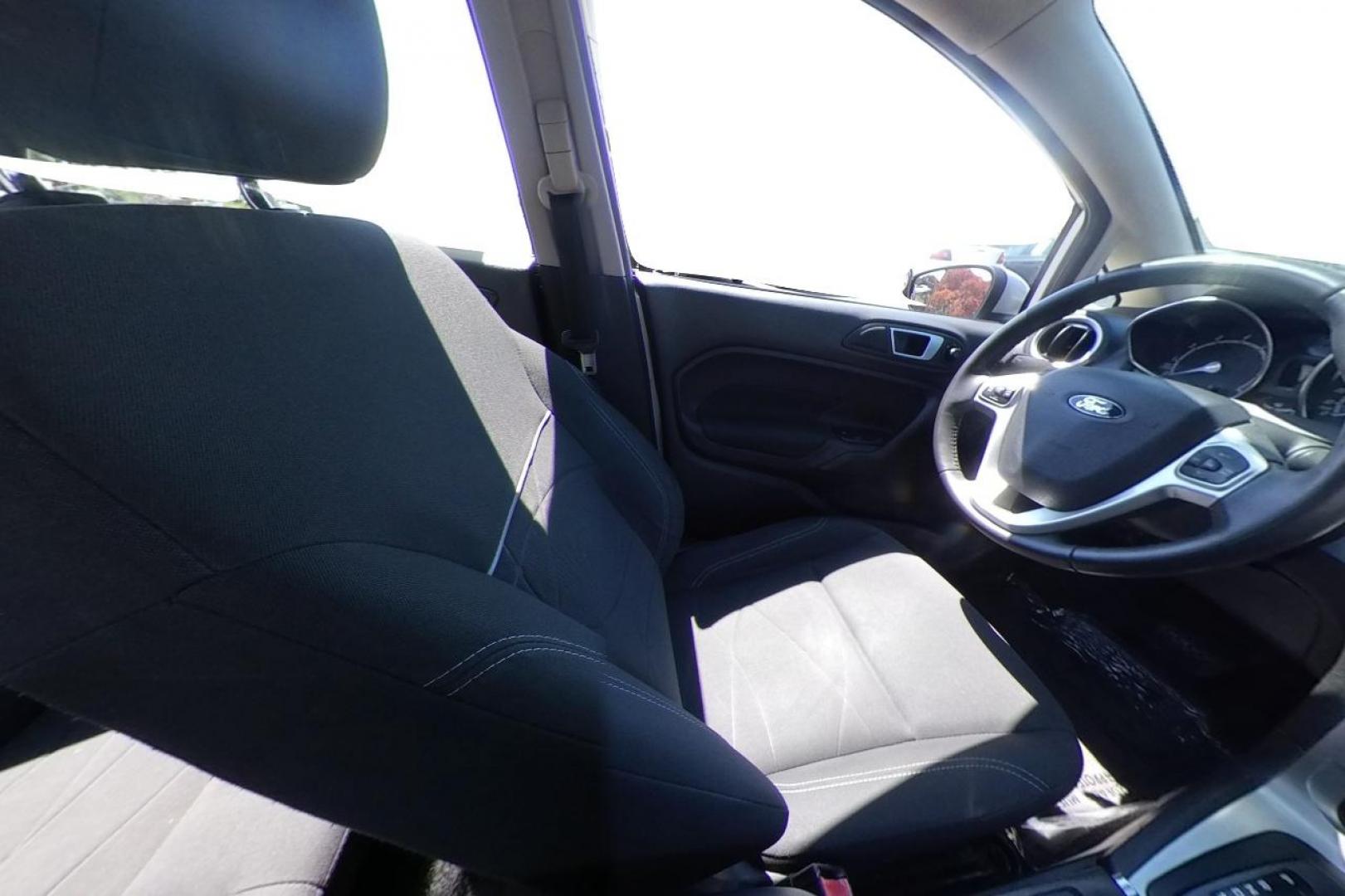 2014 Silver Ford Fiesta SE Sedan (3FADP4BJ8EM) with an 1.6L L4 DOHC 16V engine, Manual, 5-Spd transmission, located at 767 S State Road, Pleasant Grove, UT, 84062, (801) 785-1058, 40.354839, -111.736687 - Photo#17