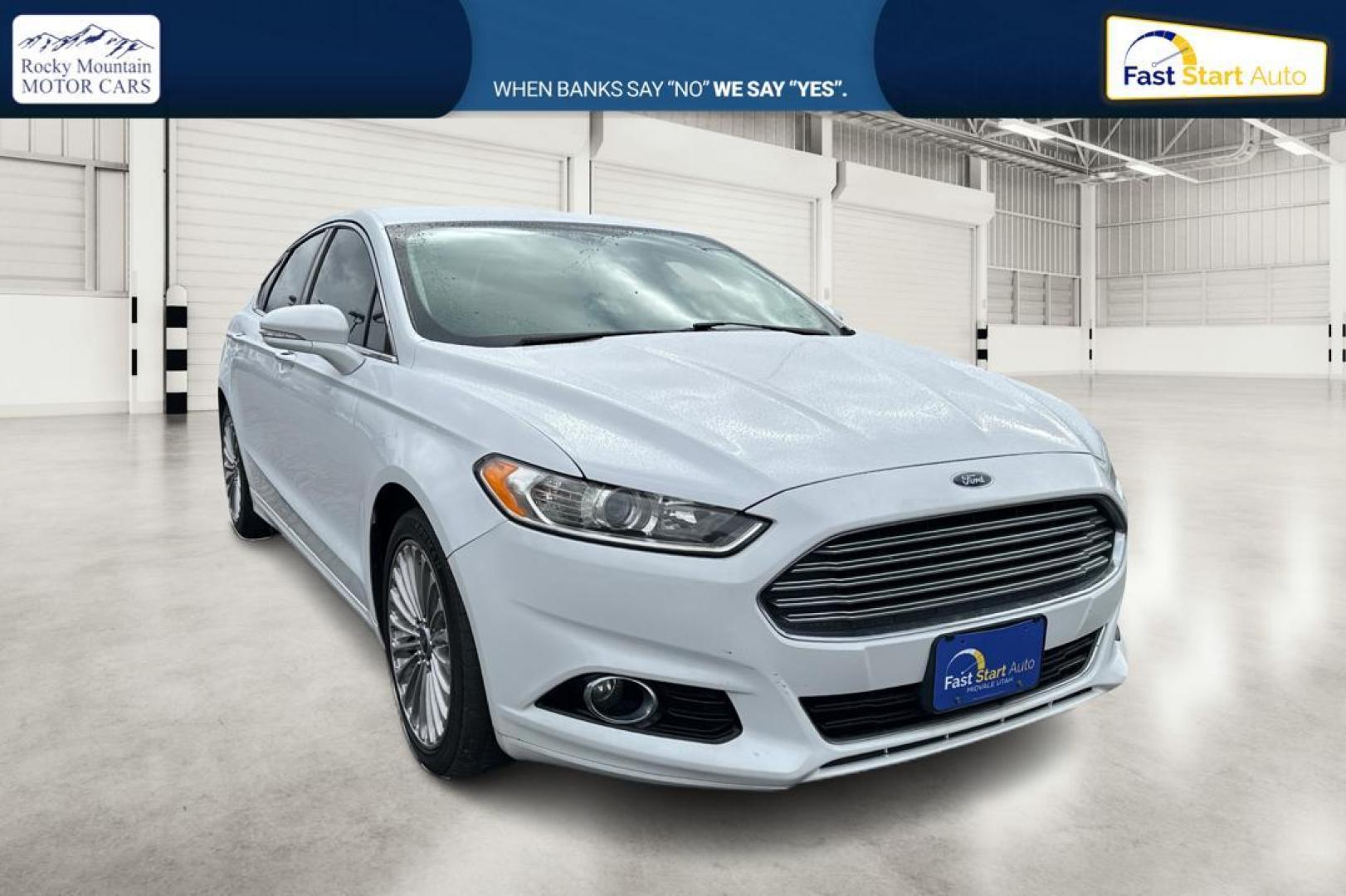 2014 White Ford Fusion Titanium (3FA6P0K93ER) with an 2.0L L4 DOHC 16V engine, Automatic, 6-Spd transmission, located at 7755 State Street, Midvale, UT, 84047, (801) 753-9063, 40.610329, -111.890656 - Photo#0