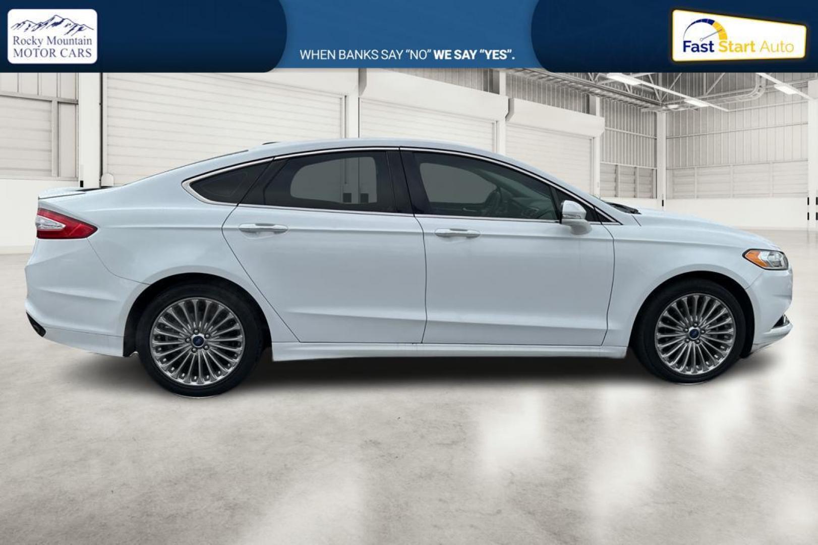 2014 White Ford Fusion Titanium (3FA6P0K93ER) with an 2.0L L4 DOHC 16V engine, Automatic, 6-Spd transmission, located at 7755 State Street, Midvale, UT, 84047, (801) 753-9063, 40.610329, -111.890656 - Photo#1