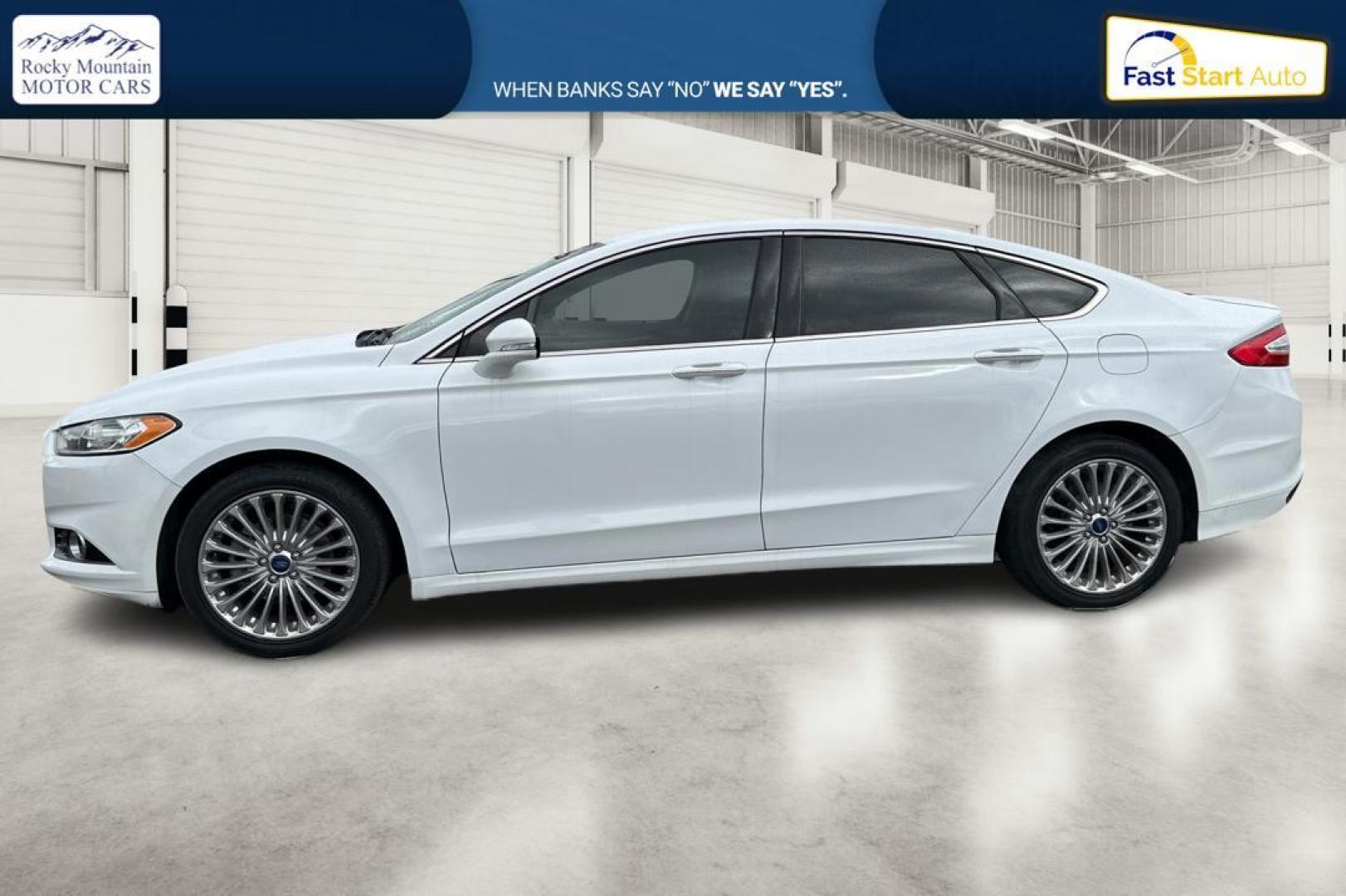2014 White Ford Fusion Titanium (3FA6P0K93ER) with an 2.0L L4 DOHC 16V engine, Automatic, 6-Spd transmission, located at 7755 State Street, Midvale, UT, 84047, (801) 753-9063, 40.610329, -111.890656 - Photo#6