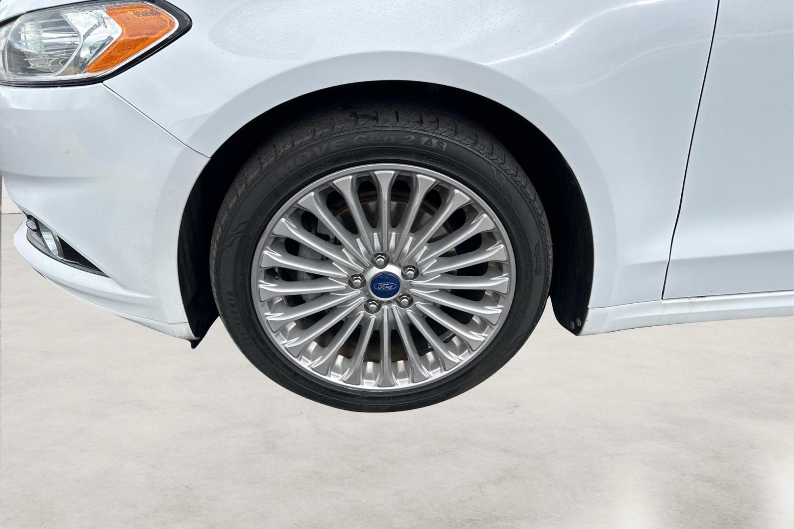 2014 White Ford Fusion Titanium (3FA6P0K93ER) with an 2.0L L4 DOHC 16V engine, Automatic, 6-Spd transmission, located at 7755 State Street, Midvale, UT, 84047, (801) 753-9063, 40.610329, -111.890656 - Photo#12