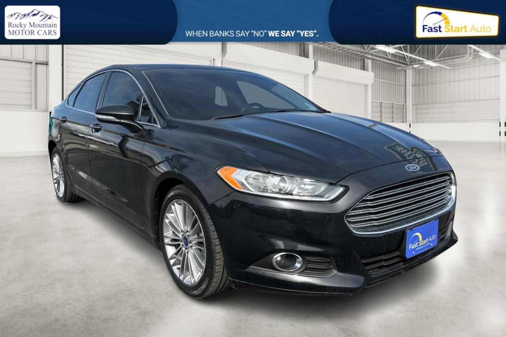 2014 Black Ford Fusion SE (3FA6P0H94ER) with an 2.0L L4 DOHC 16V engine, Automatic, 6-Spd transmission, located at 767 S State Road, Pleasant Grove, UT, 84062, (801) 785-1058, 40.354839, -111.736687 - Photo#0