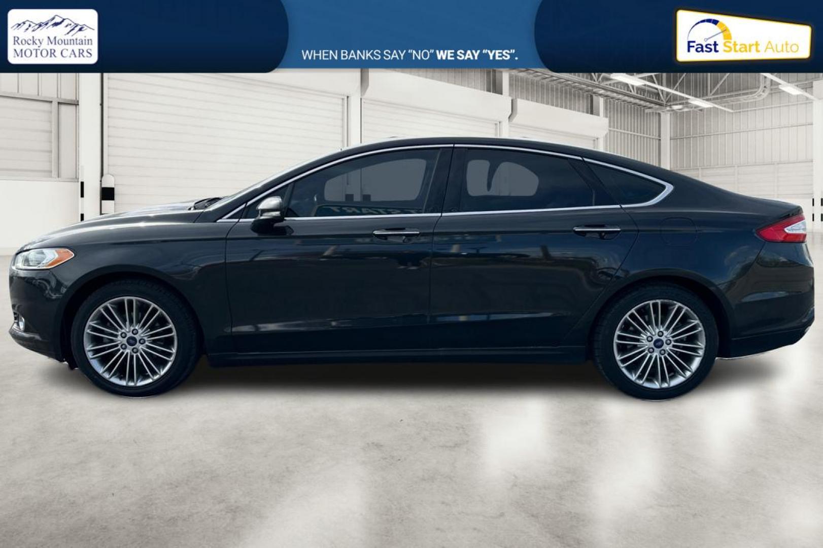 2014 Black Ford Fusion SE (3FA6P0H94ER) with an 2.0L L4 DOHC 16V engine, Automatic, 6-Spd transmission, located at 767 S State Road, Pleasant Grove, UT, 84062, (801) 785-1058, 40.354839, -111.736687 - Photo#6