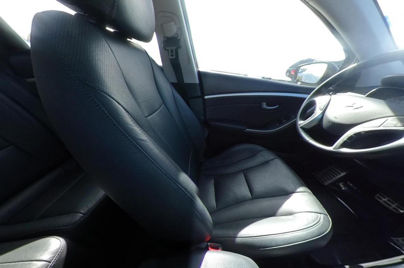 2014 Black Hyundai Elantra GT A/T (KMHD35LH8EU) with an 2.0L L4 16V DOHC engine, 6-Speed Automatic transmission, located at 7755 State Street, Midvale, UT, 84047, (801) 753-9063, 40.610329, -111.890656 - Photo#19