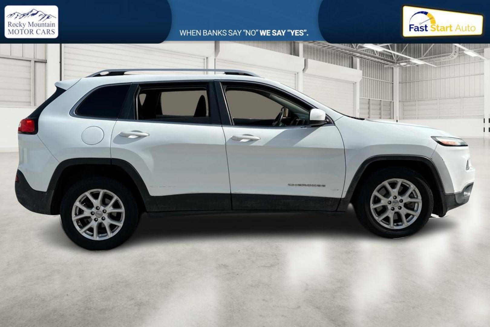 2014 White Jeep Cherokee Latitude FWD (1C4PJLCB5EW) with an 2.4L L4 DOHC 16V engine, 9-Speed Automatic transmission, located at 7755 State Street, Midvale, UT, 84047, (801) 753-9063, 40.610329, -111.890656 - Photo#1