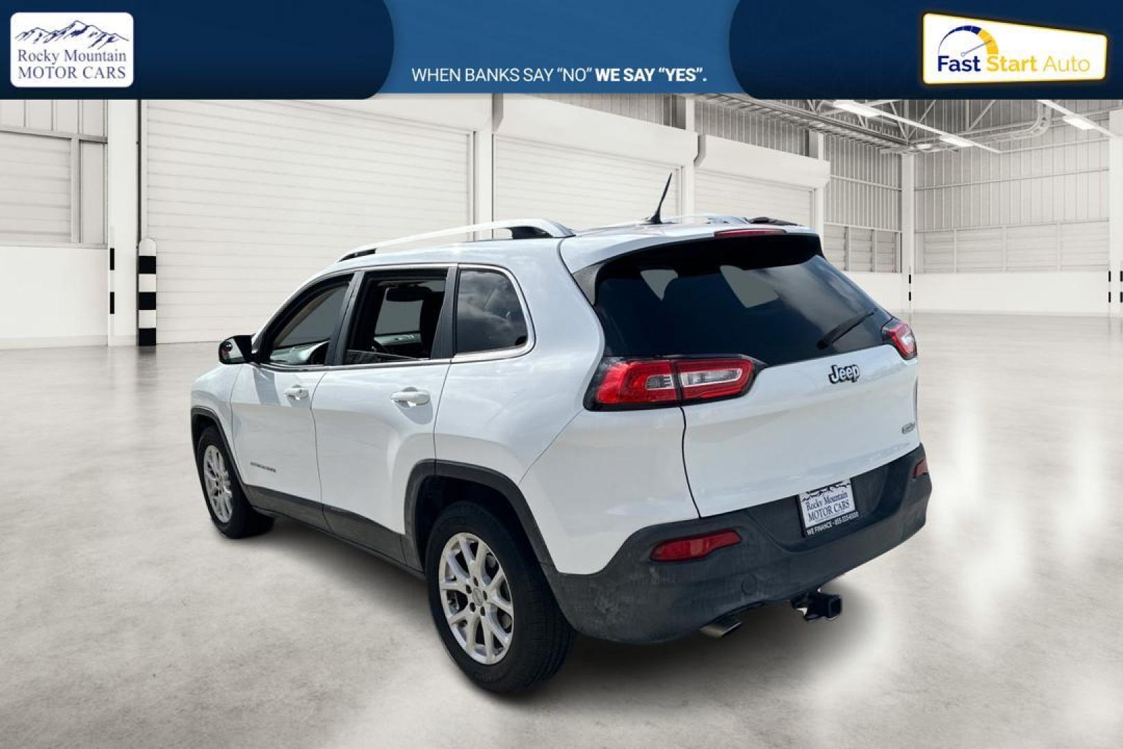 2014 White Jeep Cherokee Latitude FWD (1C4PJLCB5EW) with an 2.4L L4 DOHC 16V engine, 9-Speed Automatic transmission, located at 7755 State Street, Midvale, UT, 84047, (801) 753-9063, 40.610329, -111.890656 - Photo#5