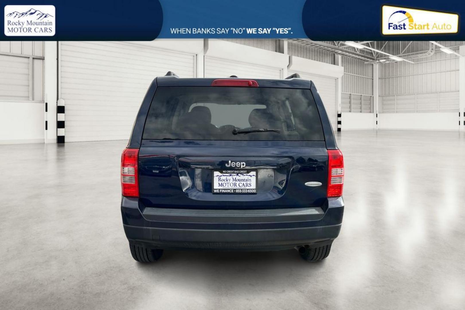 2014 Blue Jeep Patriot Latitude 2WD (1C4NJPFA5ED) with an 2.0L L4 DOHC 16V engine, Automatic, 6-Spd w/AutoStick transmission, located at 7755 State Street, Midvale, UT, 84047, (801) 753-9063, 40.610329, -111.890656 - Photo#4