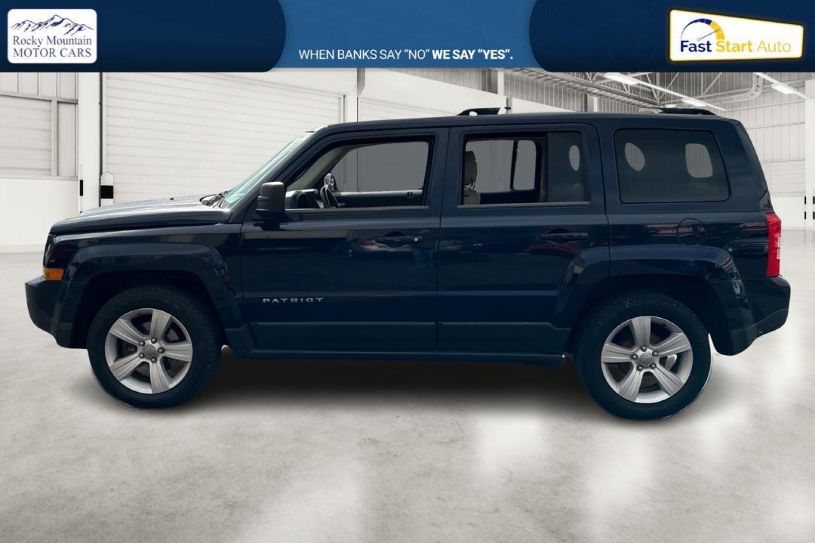 2014 Blue Jeep Patriot Latitude 2WD (1C4NJPFA5ED) with an 2.0L L4 DOHC 16V engine, Automatic, 6-Spd w/AutoStick transmission, located at 7755 State Street, Midvale, UT, 84047, (801) 753-9063, 40.610329, -111.890656 - Photo#6