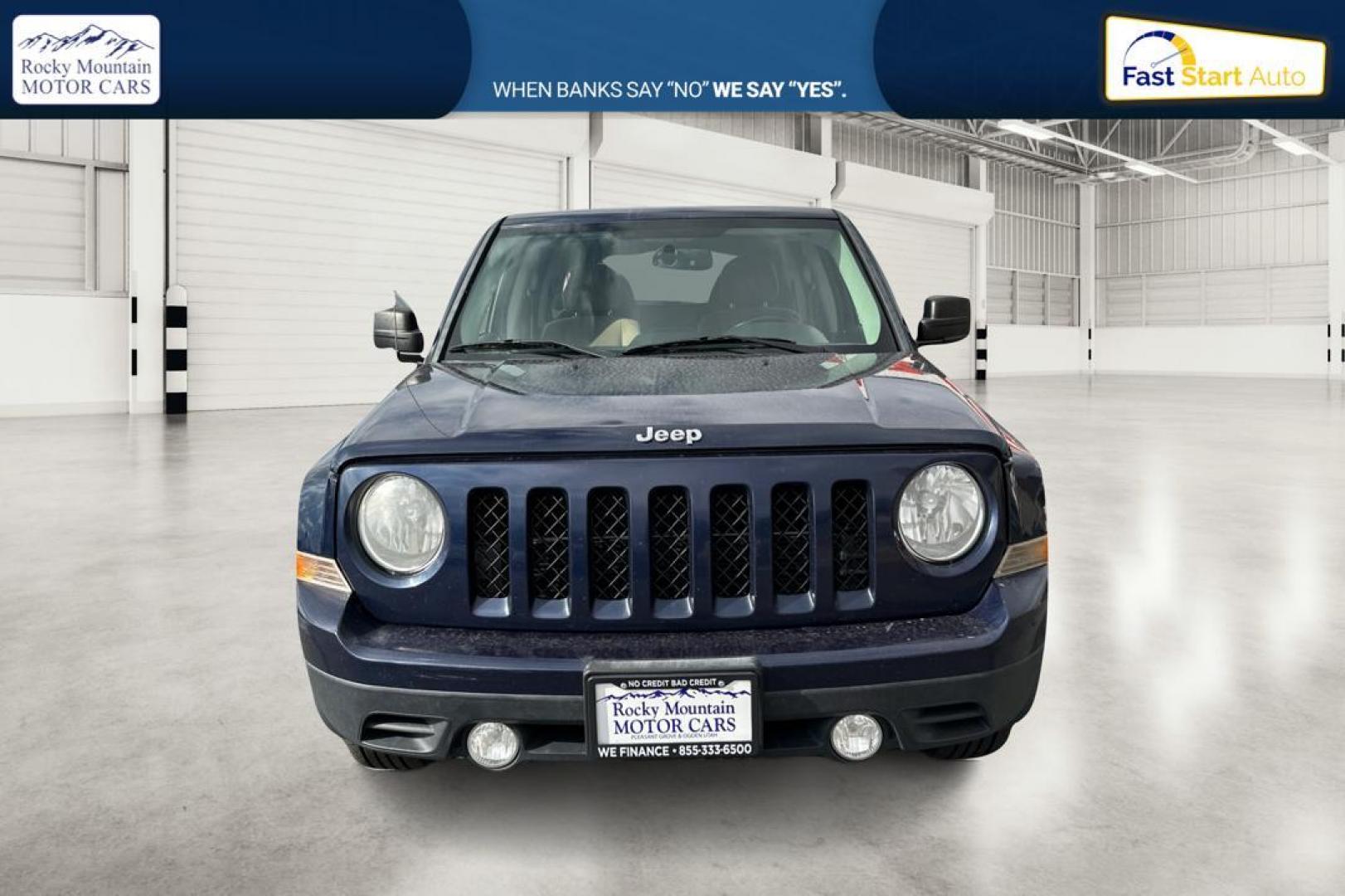 2014 Blue Jeep Patriot Latitude 2WD (1C4NJPFA5ED) with an 2.0L L4 DOHC 16V engine, Automatic, 6-Spd w/AutoStick transmission, located at 7755 State Street, Midvale, UT, 84047, (801) 753-9063, 40.610329, -111.890656 - Photo#9
