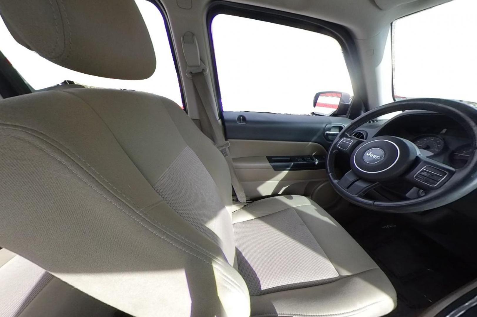 2014 Blue Jeep Patriot Latitude 2WD (1C4NJPFA5ED) with an 2.0L L4 DOHC 16V engine, Automatic, 6-Spd w/AutoStick transmission, located at 7755 State Street, Midvale, UT, 84047, (801) 753-9063, 40.610329, -111.890656 - Photo#17