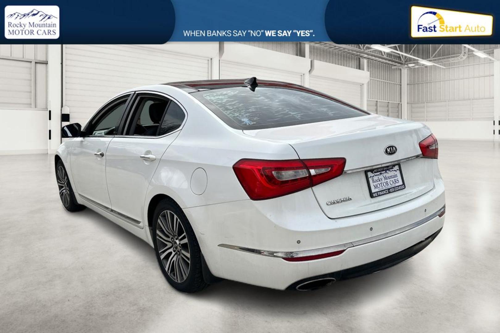 2014 White Kia Cadenza Sedan (KNALN4D78E5) with an 3.3L V6 DOHC 24V engine, 6-Speed Automatic transmission, located at 767 S State Road, Pleasant Grove, UT, 84062, (801) 785-1058, 40.354839, -111.736687 - Photo#5