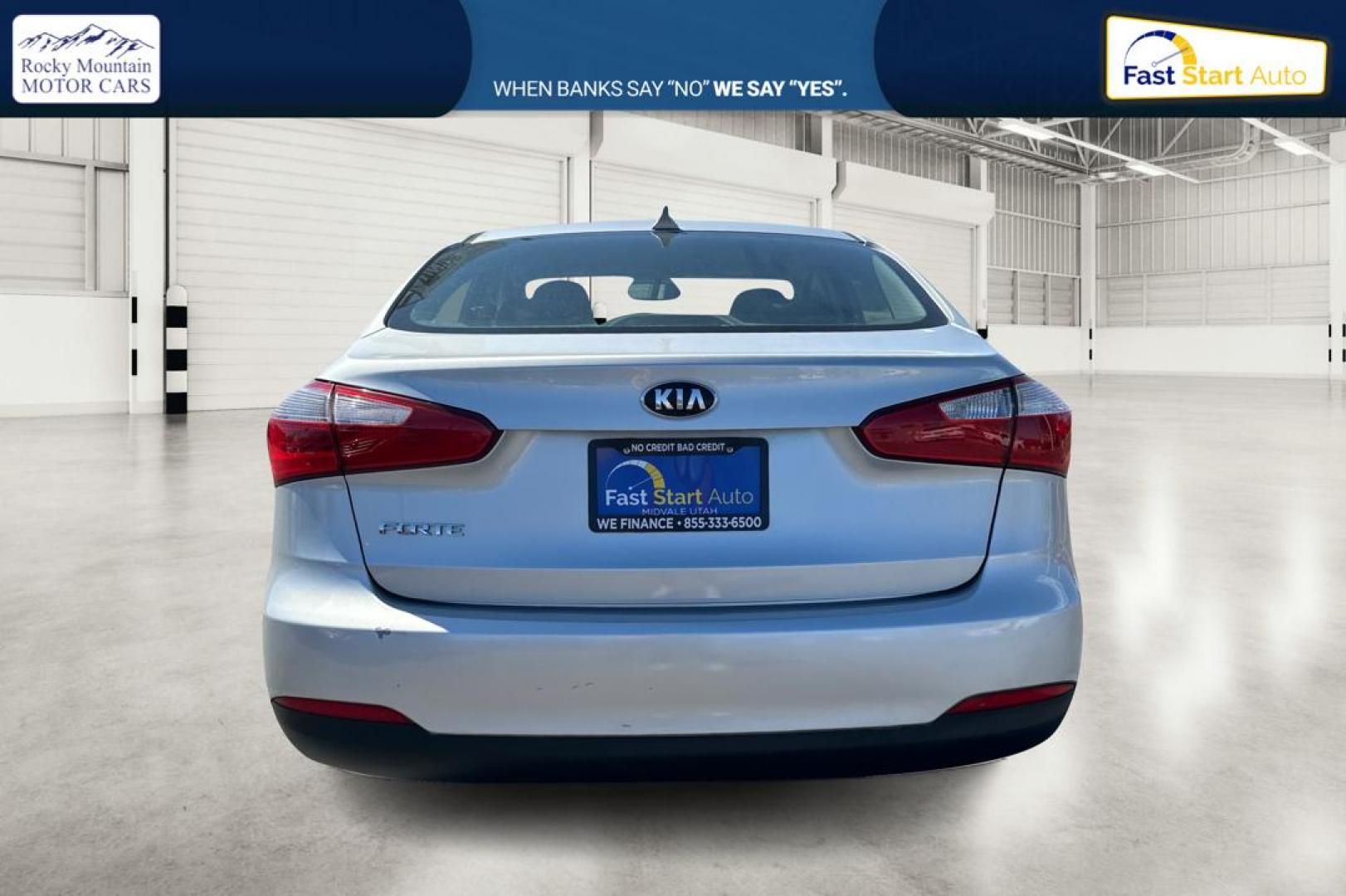 2014 Silver Kia Forte EX (KNAFX4A64E5) with an 1.8L L4 DOHC 16V engine, 6-Speed Automatic transmission, located at 7755 State Street, Midvale, UT, 84047, (801) 753-9063, 40.610329, -111.890656 - Photo#4
