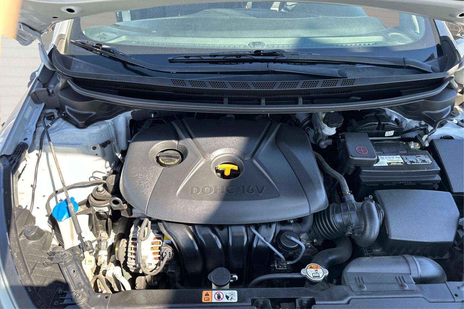 2014 Silver Kia Forte EX (KNAFX4A64E5) with an 1.8L L4 DOHC 16V engine, 6-Speed Automatic transmission, located at 7755 State Street, Midvale, UT, 84047, (801) 753-9063, 40.610329, -111.890656 - Photo#10