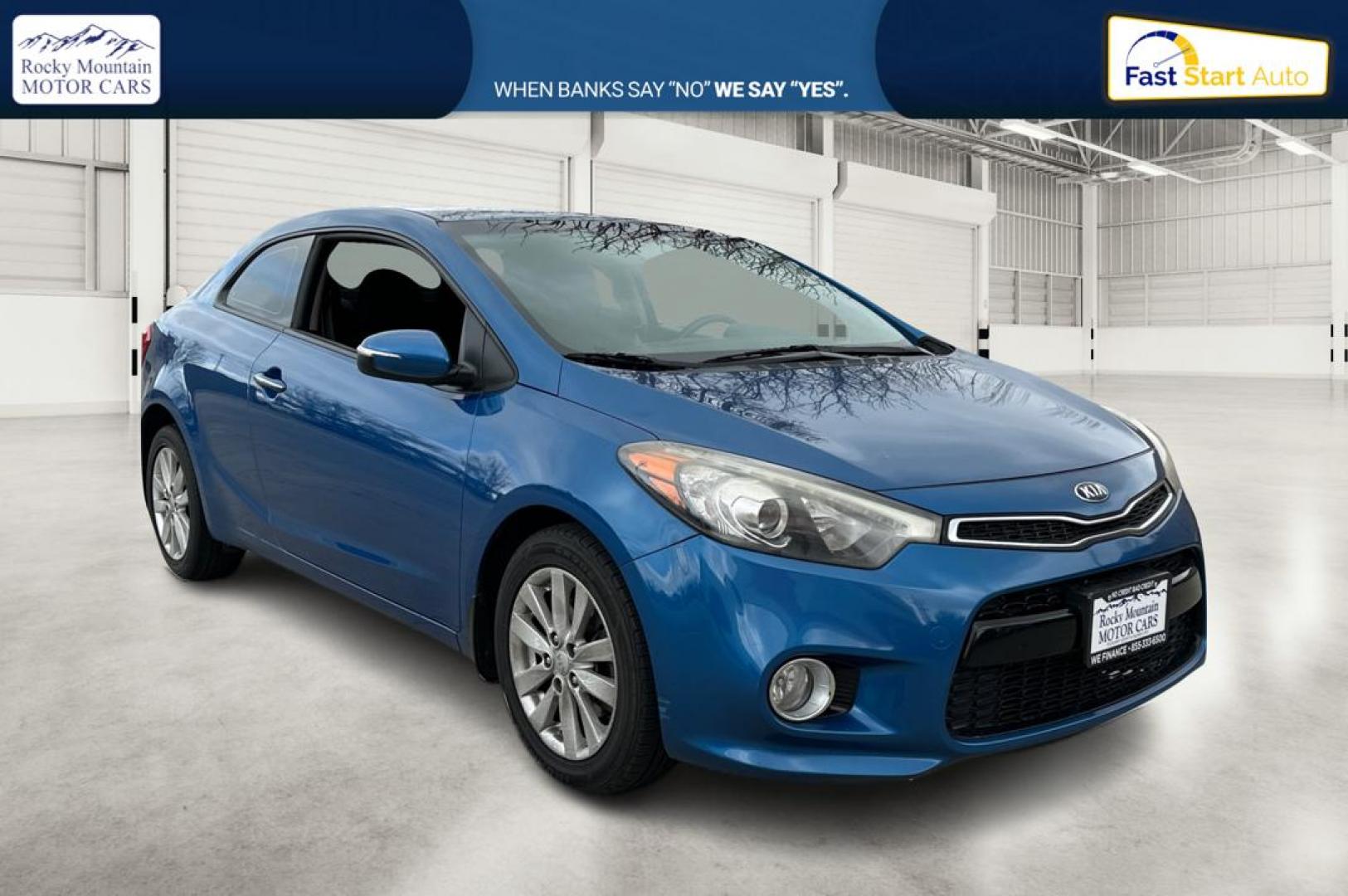 2014 Blue Kia Forte Koup EX (KNAFX6A86E5) with an 2.0L L4 DOHC 16V engine, 6-Speed Automatic transmission, located at 767 S State Road, Pleasant Grove, UT, 84062, (801) 785-1058, 40.354839, -111.736687 - Photo#0