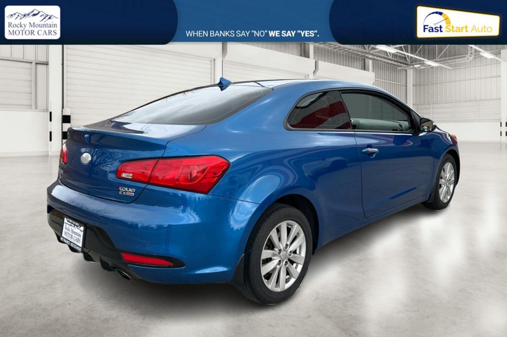 2014 Blue Kia Forte Koup EX (KNAFX6A86E5) with an 2.0L L4 DOHC 16V engine, 6-Speed Automatic transmission, located at 767 S State Road, Pleasant Grove, UT, 84062, (801) 785-1058, 40.354839, -111.736687 - Photo#2