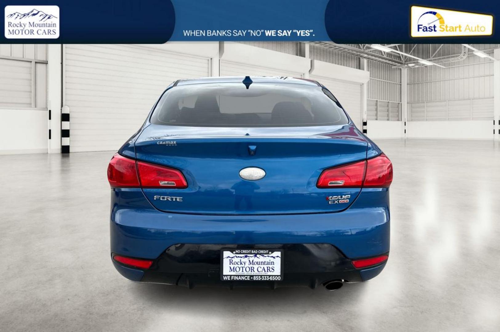 2014 Blue Kia Forte Koup EX (KNAFX6A86E5) with an 2.0L L4 DOHC 16V engine, 6-Speed Automatic transmission, located at 767 S State Road, Pleasant Grove, UT, 84062, (801) 785-1058, 40.354839, -111.736687 - Photo#4