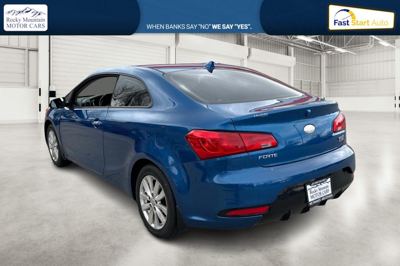 2014 Blue Kia Forte Koup EX (KNAFX6A86E5) with an 2.0L L4 DOHC 16V engine, 6-Speed Automatic transmission, located at 767 S State Road, Pleasant Grove, UT, 84062, (801) 785-1058, 40.354839, -111.736687 - Photo#5