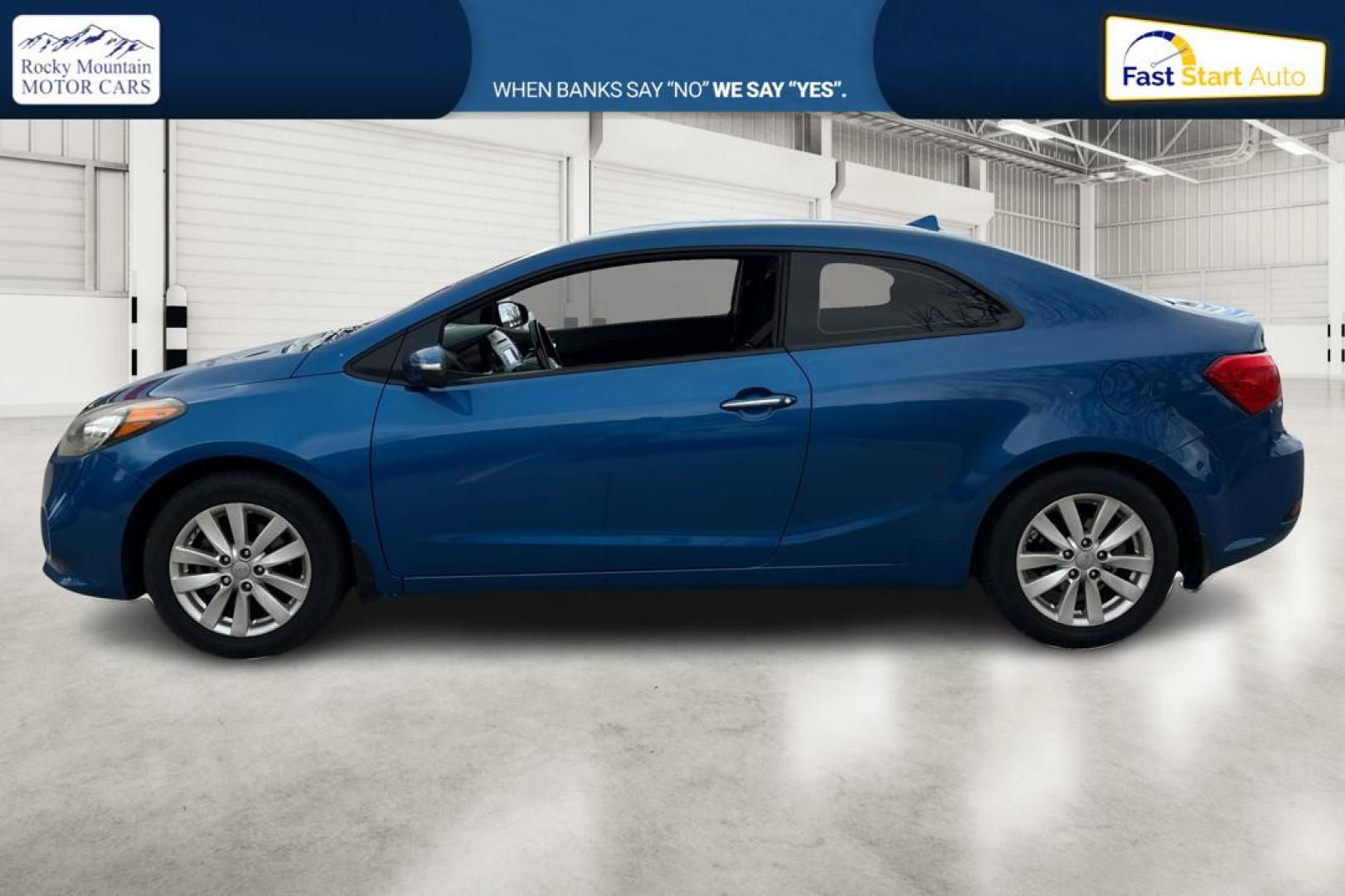 2014 Blue Kia Forte Koup EX (KNAFX6A86E5) with an 2.0L L4 DOHC 16V engine, 6-Speed Automatic transmission, located at 767 S State Road, Pleasant Grove, UT, 84062, (801) 785-1058, 40.354839, -111.736687 - Photo#6