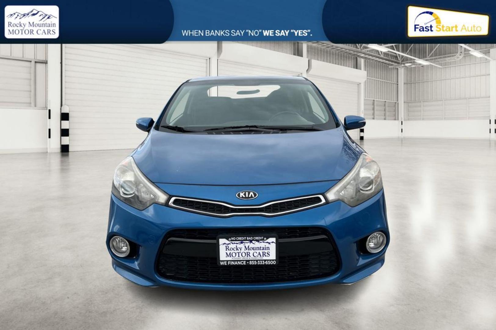 2014 Blue Kia Forte Koup EX (KNAFX6A86E5) with an 2.0L L4 DOHC 16V engine, 6-Speed Automatic transmission, located at 767 S State Road, Pleasant Grove, UT, 84062, (801) 785-1058, 40.354839, -111.736687 - Photo#9