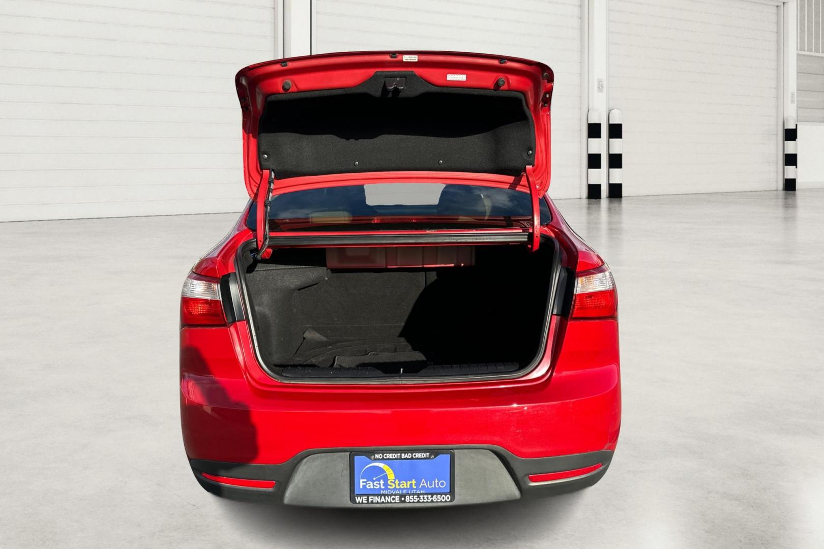 2014 Red Kia Rio LX (KNADM4A35E6) with an 1.6L L4 DOHC 16V engine, Automatic, 6-Spd transmission, located at 767 S State Road, Pleasant Grove, UT, 84062, (801) 785-1058, 40.354839, -111.736687 - Photo#13