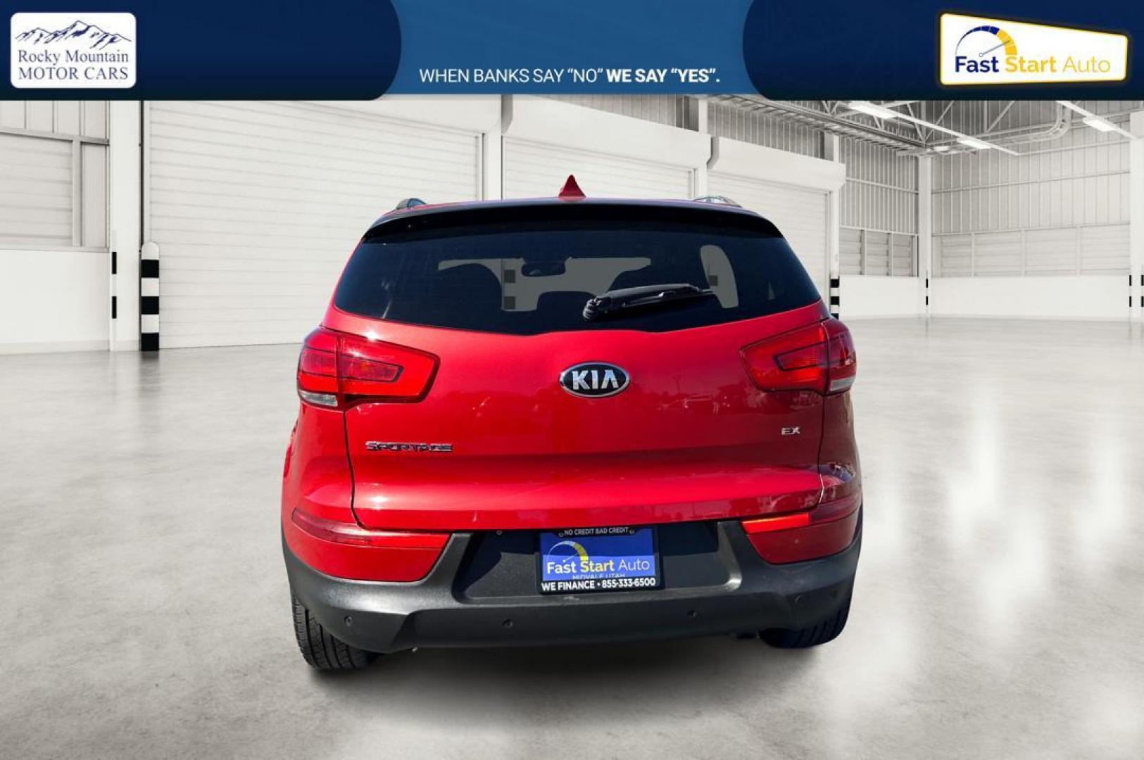 2014 Red Kia Sportage EX AWD (KNDPCCAC4E7) with an 2.4L V6 DOHC 24V engine, 6-Speed Automatic transmission, located at 7755 State Street, Midvale, UT, 84047, (801) 753-9063, 40.610329, -111.890656 - Photo#3